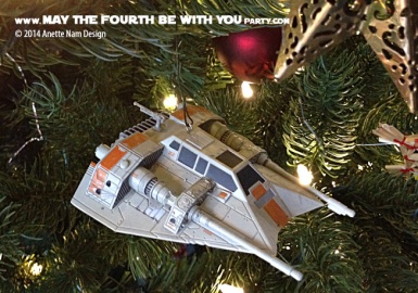 Star Wars Christmas Snow Speeder Ornament // Check out our blog for lots more Star Wars decor. // #starwars #starwarsparty #maythefourthbewithyou #starwarsbirthday #snowspeeder #Christmas maythefourthbewithyoupartyblog.com