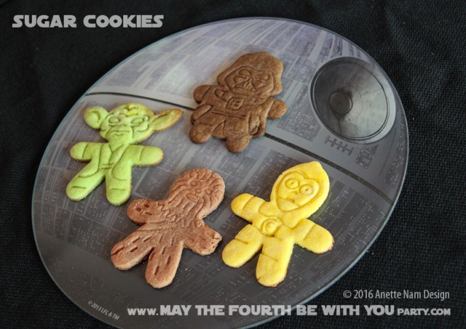 Star Wars Sugar Cookies /// Check out our blog for lots of Star Wars Party food recipes and downloadable labels! Great ideas for a Birthday Party or a May the Fourth be with you Party. /// #starwars #starwarsparty #theforceawakens #maythefourthbewithyou #starwarsbirthday #starwarsfood #sugarcookies #foodart #cookies #recipe #cookiecutter #chewbacca #chewie #c3po #darthvader #yoda #deathstar // maythefourthbewithyoupartyblog.com
