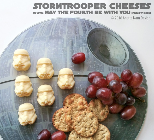 Star Wars Food: Stormtrooper Cheese Helmets (from silicone mold) and Death Star plate / Check out blog for lots of Star Wars Party food recipes and downloadable labels! Great for Birthday Party or a May the Fourth be with you Party. / #starwars #starwarsparty #maythefourthbewithyou #starwarsbirthday #starwarsfood #foodart #stormtrooper #finn #theforceawakens #clonewars #rougeone #parmesan #gouda #cheese #traderjoes #siliconemold #siliconetray #Kotobukiya / maythefourthbewithyoupartyblog.com
